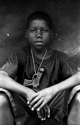 Thomas Morley, Acholi Boy with Toy Gun, Uganda, 2004