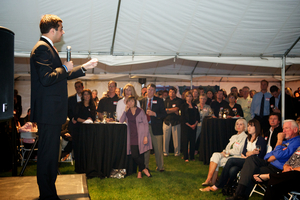 RIcky Gill '12 addresses a crowd in Lodi